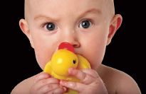 Baby with duck
